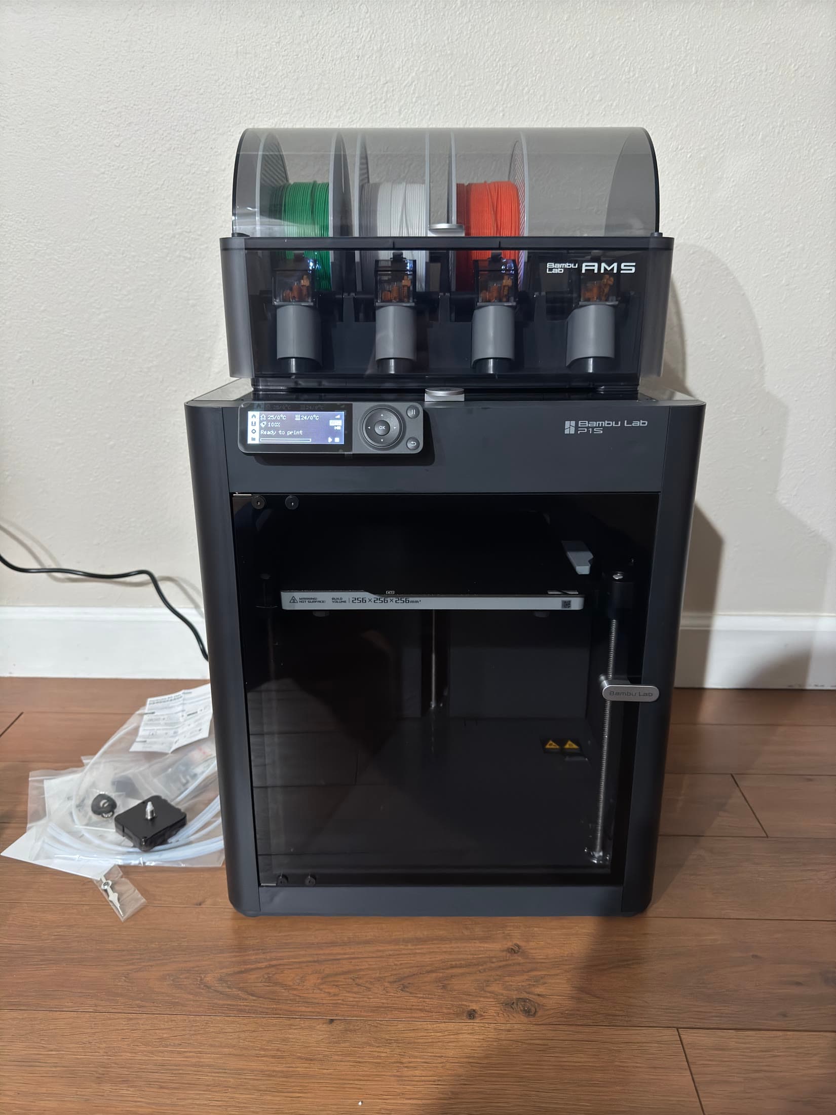 Enclosed Bambu Lab 3D printer with a multicolor filament system used for pendulum prototype parts